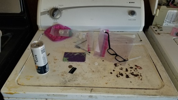 pills, beer and trash left inside house
