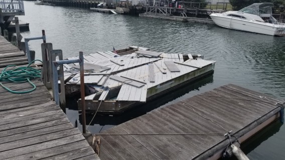 random broken docks tied to the back of the house